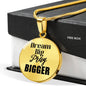 18K Gold Plated Dream Big Pray Bigger Pendant draped across gift box.