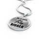 Dream Big Pray Bigger Pendant on a white background.